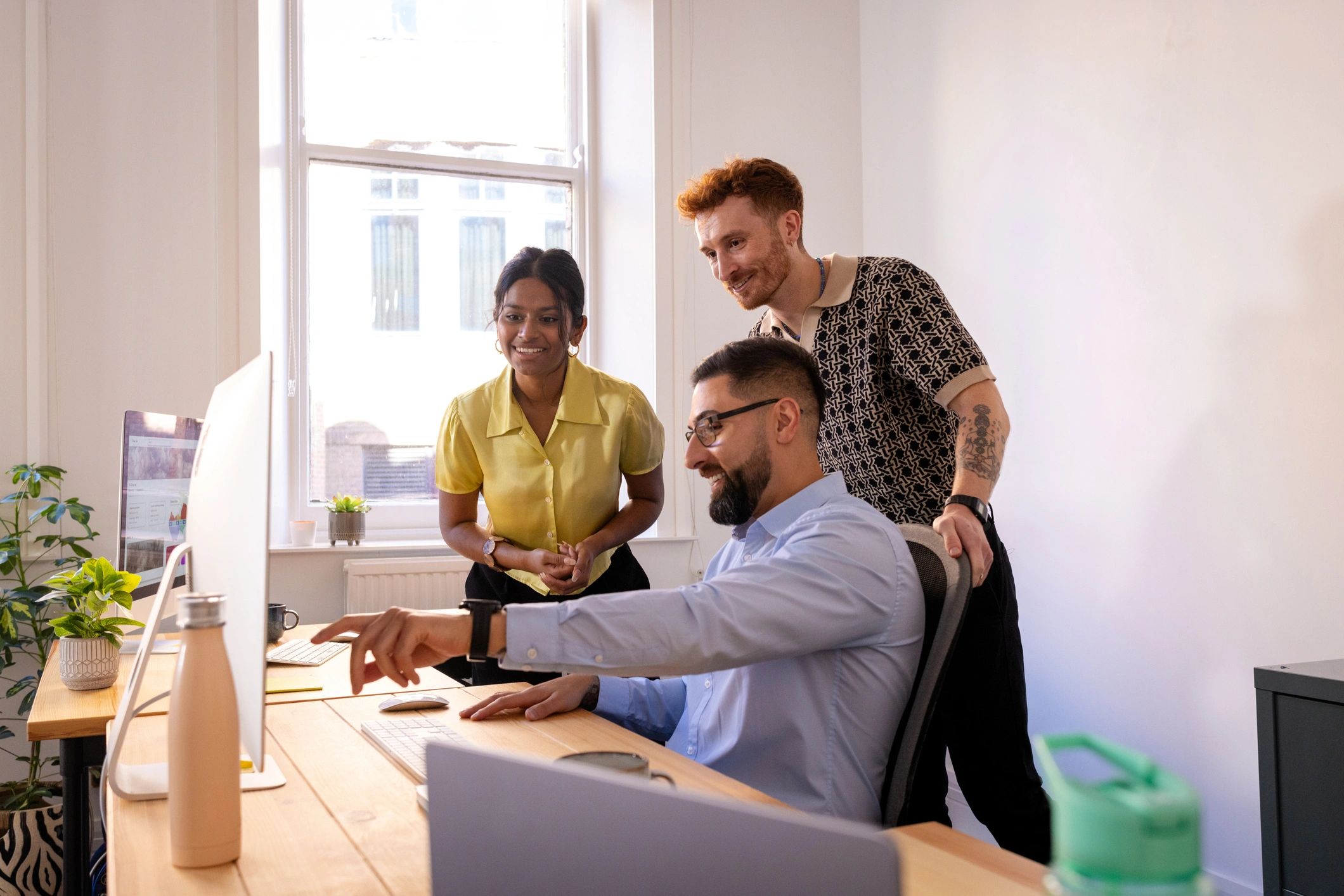 ShopEase team collaborating in a modern office