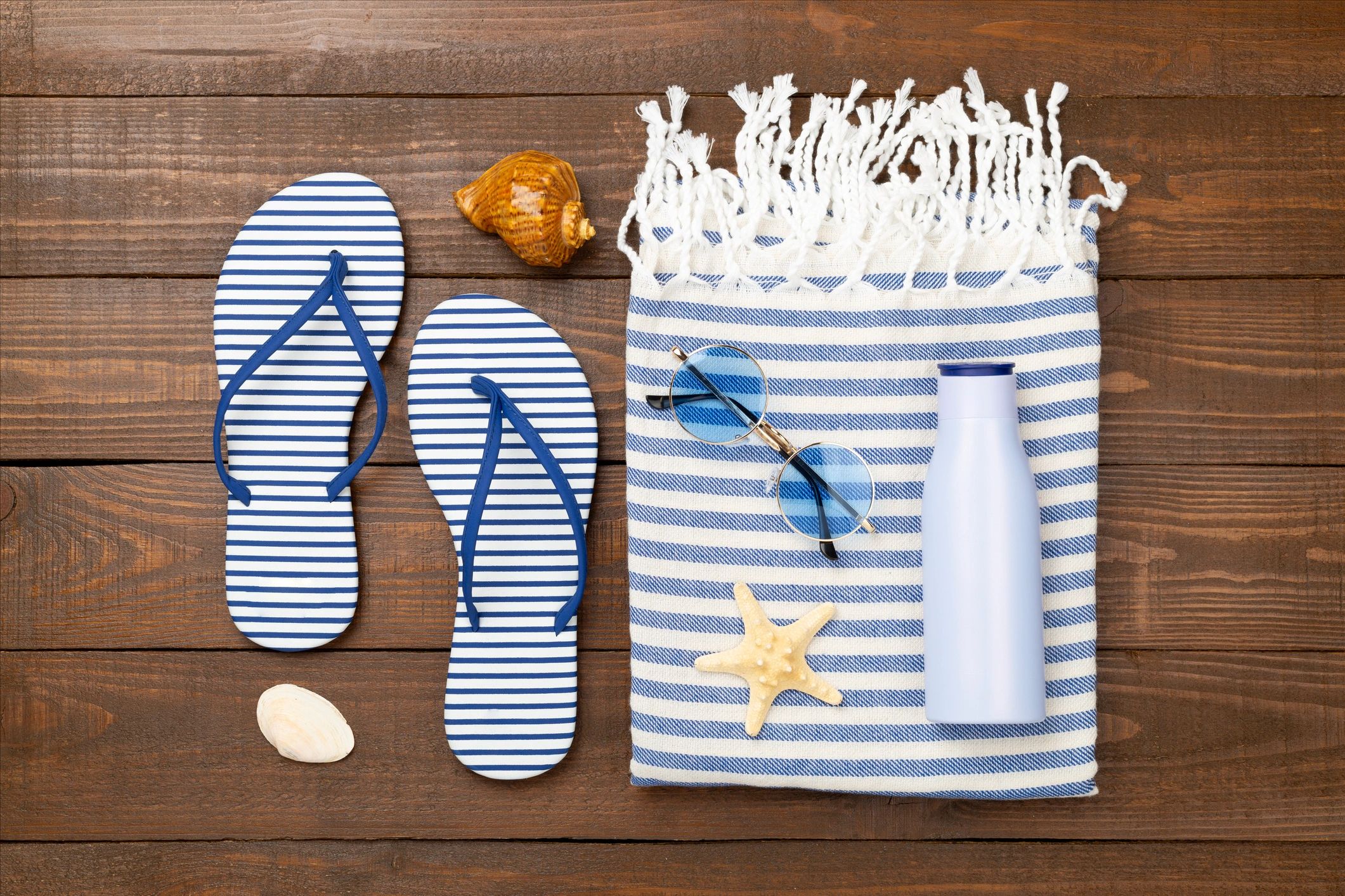 Flat lay of fashion accessories on a styled surface